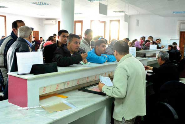 طوابير ليلية للحصول على جواز سفر قبل العام الجديد