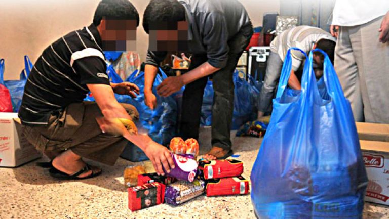توزيع 4500 قفة غذائية و1400 إعانة مالية