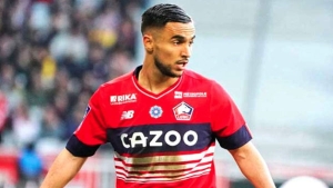 الدولي الجزائري آدم وناس