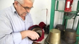 الطربوش العنابي.. قبعة الذاكرة ووسم المدينة