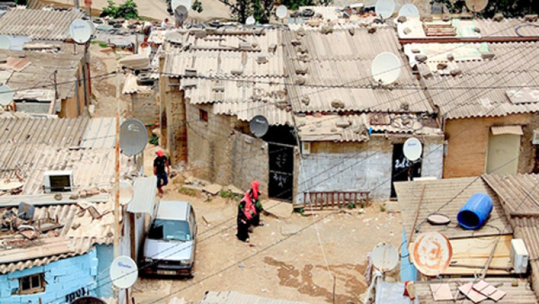 سكان القصدير يطالبون بالترحيل