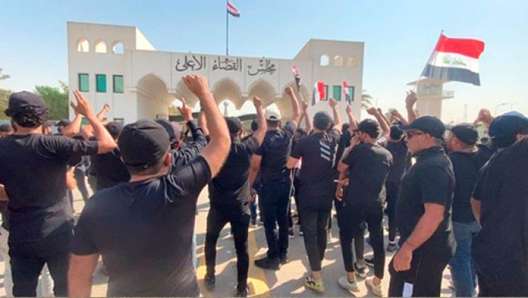 مقتل 12 عراقيا في مواجهات مع قوات الأمن