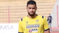 لاعب المنتخب الوطني آدم زرقان