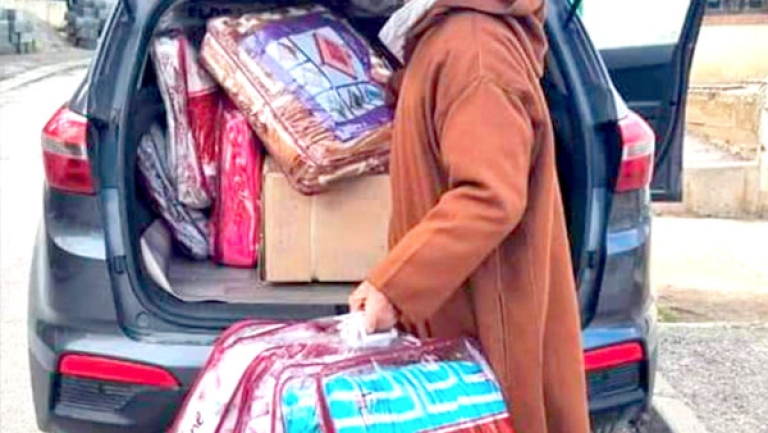 أغطية وملابس وأجهزة تدفئة لـ60 عائلة