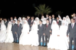 15 عريسا يدخلون قفص الزوجية في أجواء من الحبور