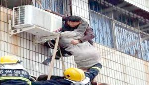 مشلول يتسلق مبنى محترق لإنقاذ امرأة حامل
