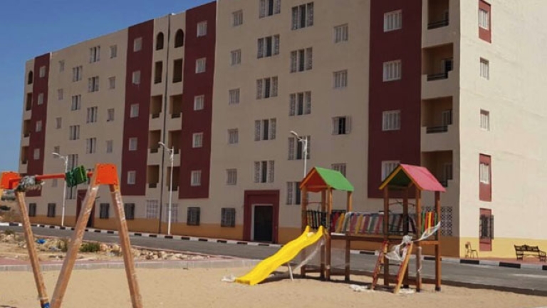 تسليم 521 وحدة سكنية